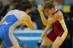 The three medallists in the women's wrestling freestyle 55kg category at the Olympic Games in Athens, Monday, August 23, 2004: Japan's Saori Yoshida (gold), Canada's Tonya Verbeek (silver) and France's Anna Gomis (bronze) (CP PHOTO)2004(COC-Mike Ridewood)
