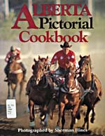 Cover of cookbook, ALBERTA PICTORIAL COOKBOOK, with a photograph of horses and a rider at the Calgary Stampede