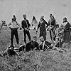 Photograph of a group of Aboriginal people and soldiers, Humboldt, Saskatchewan, circa May 12, 1885