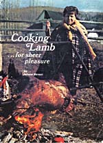 Cover of cookbook, COOKING LAMB… FOR SHEER PLEASURE, with a photograph of Madame Benoit roasting a lamb on a spit over an open fire