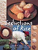 Cover of cookbook, SEDUCTIONS OF RICE: A COOKBOOK, with photographs of various rice dishes, a woman harvesting rice and samples of several varieties of rice