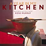 Cover of cookbook, A YEAR IN MY KITCHEN: FAVOURITE RECIPES FROM ROSE MURRAY, with a photograph of a tea towel and red bowls on a red table