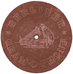 Back of a seven-inch brown disk showing the HIS MASTER'S VOICE trademark