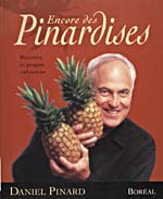 Cover of cookbook, ENCORE DES PINARDISES: RECETTES ET PROPOS CULINAIRES, with a photograph of Daniel Pinard holding two pineapples