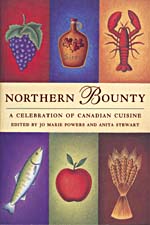 Cover of cookbook, NORTHERN BOUNTY: A CELEBRATION OF CANADIAN CUISINE, divided into six section, each containing a colourful illustration: grapes, a jug of maple syrup, a lobster, a fish, an apple and a sheaf of wheat