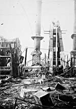 Photograph of the steamer G.B. GREENE after a fire, 27 July 1916