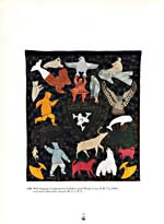 Wall hanging of various colourful animal and human figures embroidered on a black background